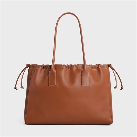 calfskin celine tote|Celine Smooth Calfskin Cuir Small Triomphe Cabas Drawstring Tan.